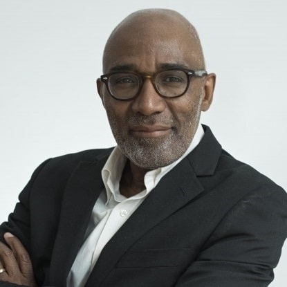 Trevor Phiilips looking at the camera with his arms crossed