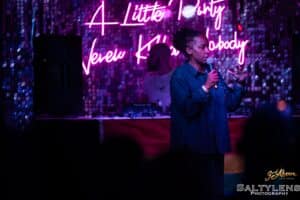 Twayna Mayne performing stand-up at Channel Islands Pride