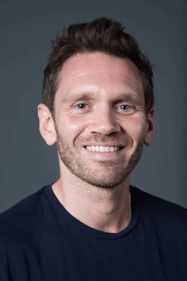 Dean Leak looking at camera