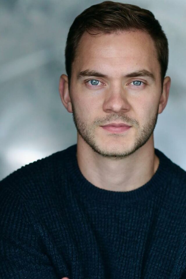 Simon Lennon with arms folded