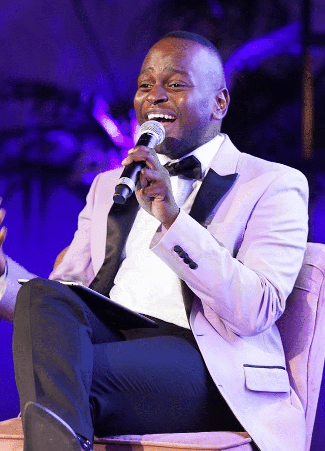Event Host and Presenter Will Njobvu in a suit
