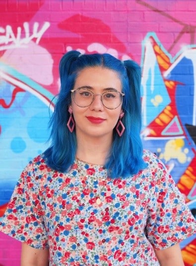 Rowan Ellis, LGBTQ speaker looking at camera