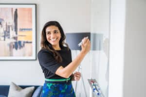 Abigail Ireland keynote speaker writing on a whiteboard
